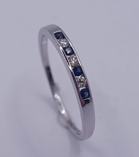 KR05-79846-*16 Anillo Oro Blanco Billante Zafiro Cintillo